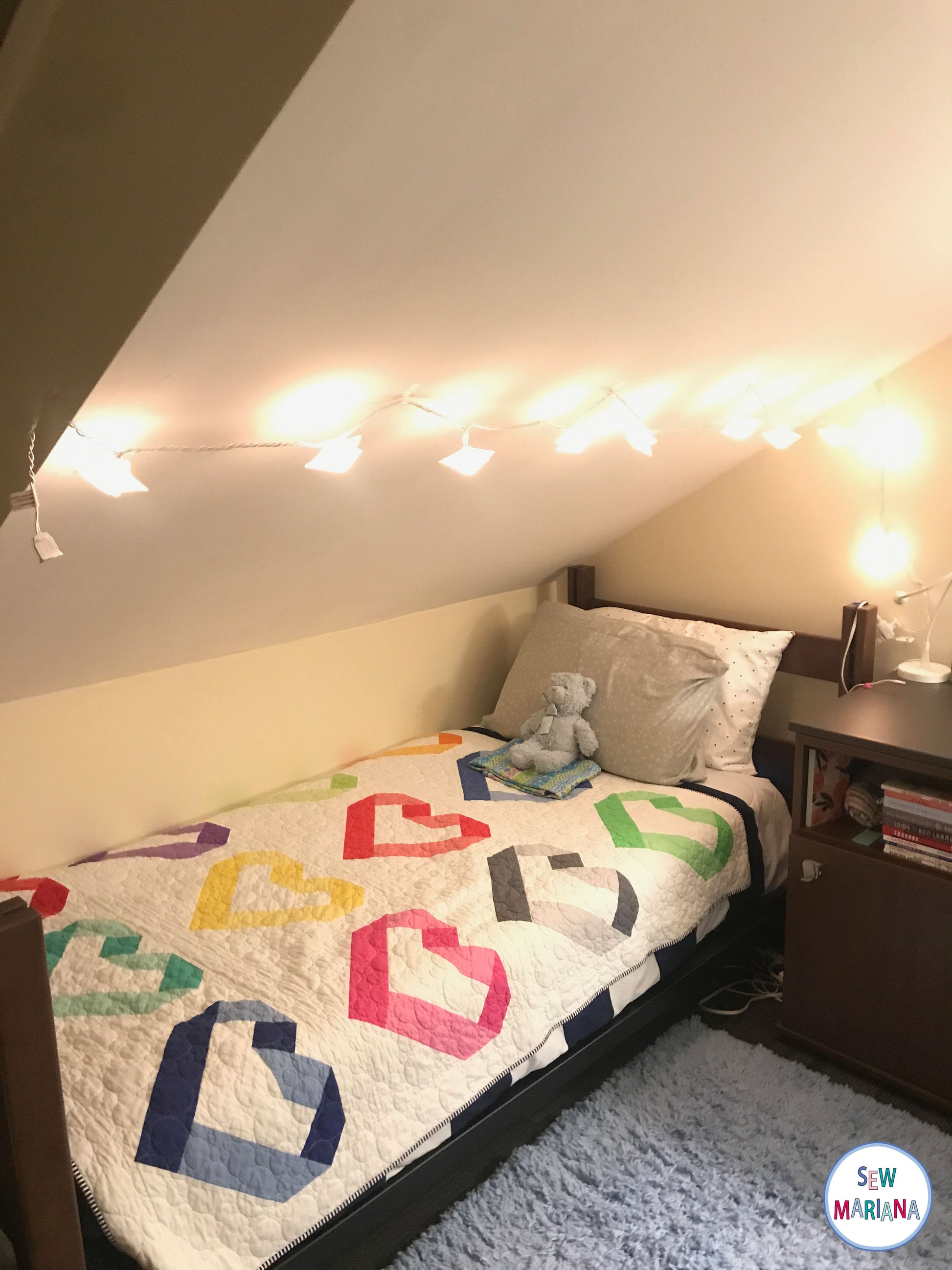 the in my heart quilt on a dorm bed